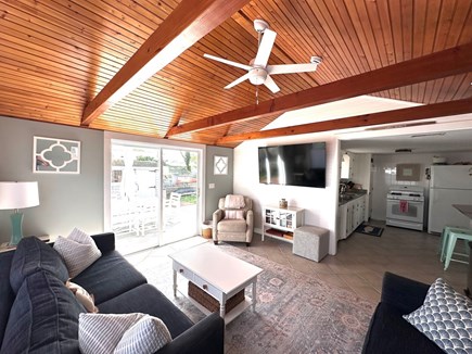West Dennis Cape Cod vacation rental - Open living room with large flat screen smart TV.