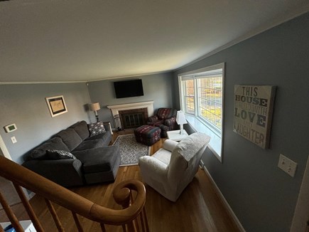 Yarmouth Cape Cod vacation rental - Living room with smart TV and fireplace.