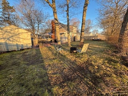 Yarmouth Cape Cod vacation rental - Fire pit with chairs.