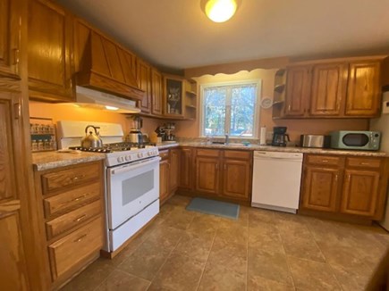 Dennis Cape Cod vacation rental - Kitchen with Gas Stove, Microwave, Dishwasher and Refrigerator.