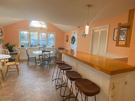 Dennis Cape Cod vacation rental - Dining area.  Washer/Dryer location.