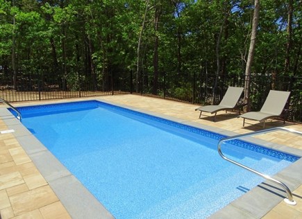 Eastham Cape Cod vacation rental - Heated, salt water pool which is fenced away from the home