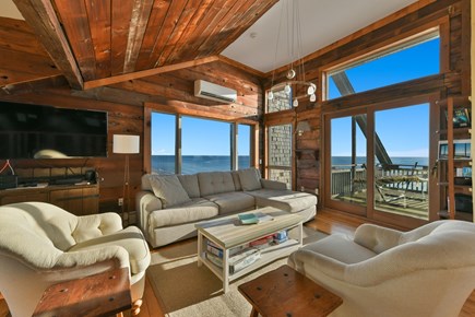 Wellfleet Cape Cod vacation rental - Top level living room with picture window and slide to the deck