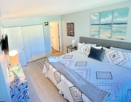 Brewster, Ocean Edge Cape Cod vacation rental - Master bedroom with Smart TV and ensuite bathroom