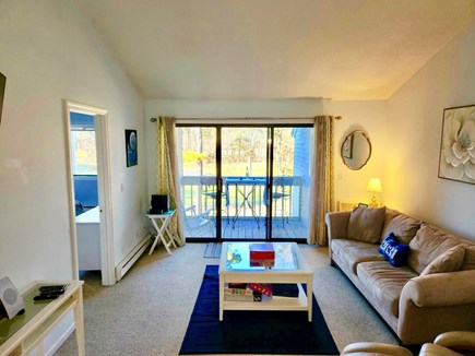 Brewster, Ocean Edge Cape Cod vacation rental - Our living room with a walkout balcony and golf course views