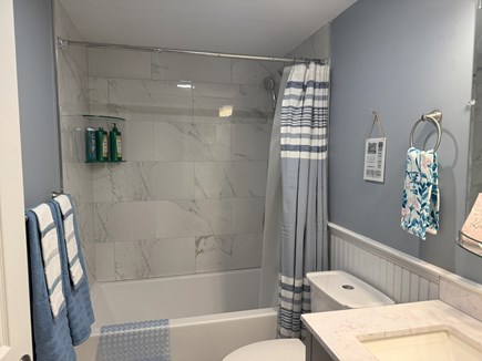 West Yarmouth Cape Cod vacation rental - Full bathroom with deep bathtub / shower & sink / vanity.