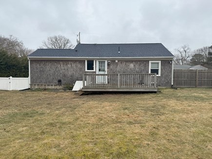 West Yarmouth Cape Cod vacation rental - Fenced in backyard & deck.