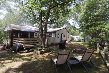 South Dennis Cape Cod vacation rental - Back & Yard with Outdoor Shower & Grill