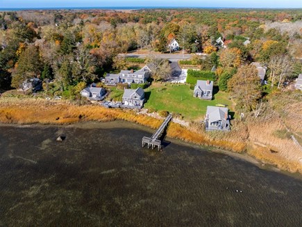 Eastham Cape Cod vacation rental - Bell Buoy is the cottage to the left of the dock