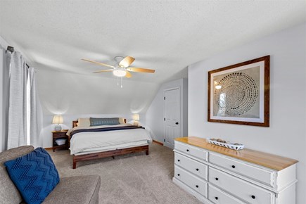 Eastham Cape Cod vacation rental - Upstairs primary bedroom with a King size bed