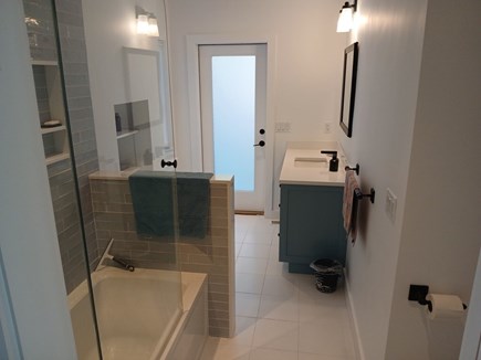 Wellfleet Cape Cod vacation rental - First floor bath off hall with door to outdoor shower