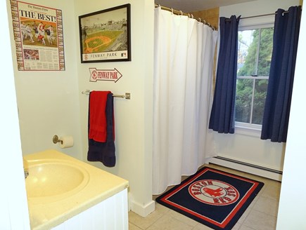 Brewster Cape Cod vacation rental - Main floor full bathroom with tub and laundry - Go Sox!