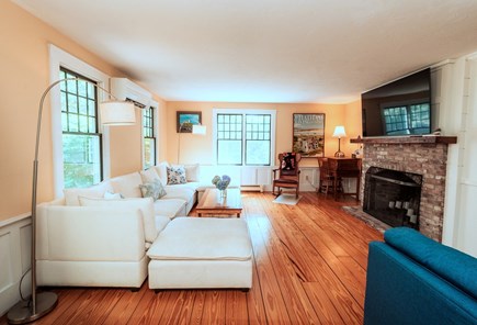 Brewster Cape Cod vacation rental - Large living room with hardwood floors, sectional and TV
