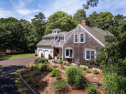 Brewster Cape Cod vacation rental - House situated on an acre of land - gardens, back and side yard.