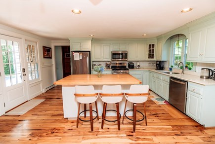 Brewster Cape Cod vacation rental - Kitchen area facing the main entrance into house