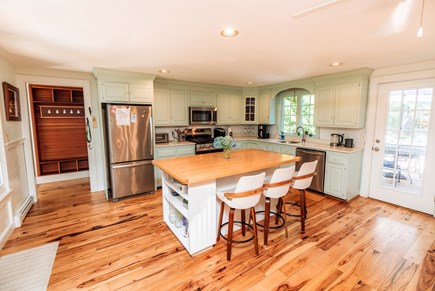 Brewster Cape Cod vacation rental - Lovely kitchen with back door to deck area