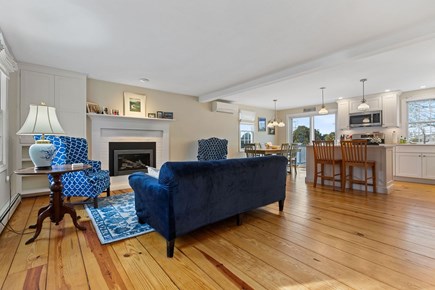 Dennis Cape Cod vacation rental - Bright living room with split AC open to kitchen, dining area an