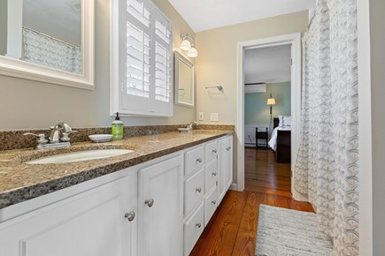 Dennis Cape Cod vacation rental - Jack-and-Jill bathroom on 2nd floor with tub/shower