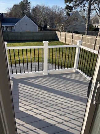 Yarmouth Cape Cod vacation rental - Outdoor deck and fully fenced in backyard