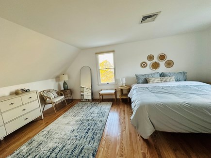 Eastham Cape Cod vacation rental - Upstairs: king bed, dresser and closet, and sitting area.