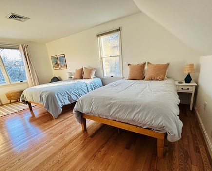 Eastham Cape Cod vacation rental - Upstairs: includes 2 full-beds, a sitting area, dresser & closet.