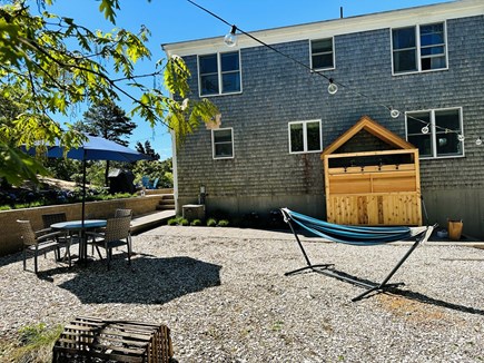 Eastham Cape Cod vacation rental - Outdoor oasis with shower, hammock, dining area and grill