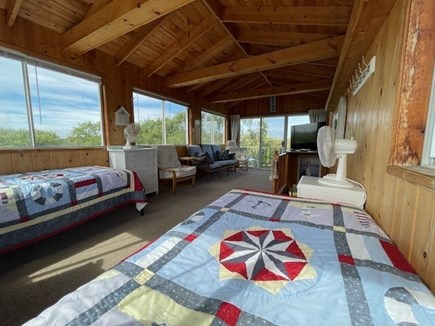 Dennis Cape Cod vacation rental - Loft above the porch with 2 twin, sitting area,slider to balcony