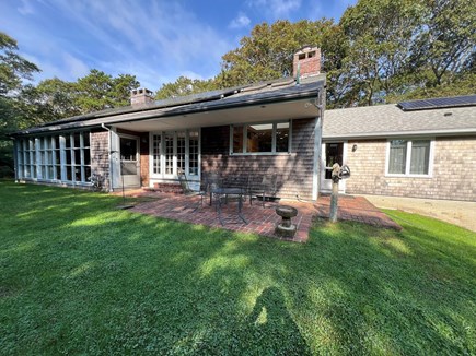 Bourne, Buzzards Bay Cape Cod vacation rental - Rear porch with sitting area.