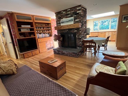 Bourne, Buzzards Bay Cape Cod vacation rental - TV area with a cozy fireplace off the kitchen