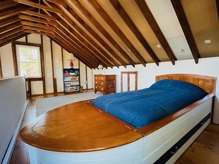 Harwich Cape Cod vacation rental - Climb the ladder stairs to loft for boat bed w/trundle & games