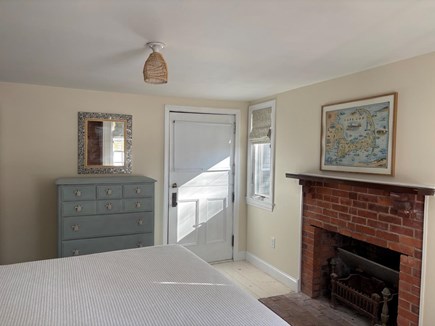 Harwich Cape Cod vacation rental - BR features fireplace (does not work) and Dutch door