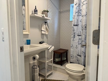 South Yarmouth/Bass River  Cape Cod vacation rental - White…fresh subway tile…cabinet over wc …waterfall /euro shower