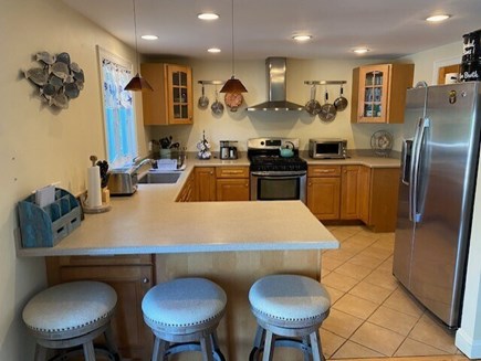 West Yarmouth-Lewis Bay Cape Cod vacation rental - Kitchen with gas stove and dishwasher, microwave and toaster.