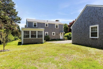 Brewster Cape Cod vacation rental - Back of property. Plan for deck to be added by June off rear.