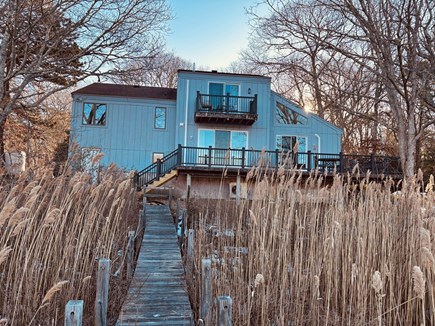 East Falmouth Cape Cod vacation rental - Back of home showing deck & balcony with exquisite water views