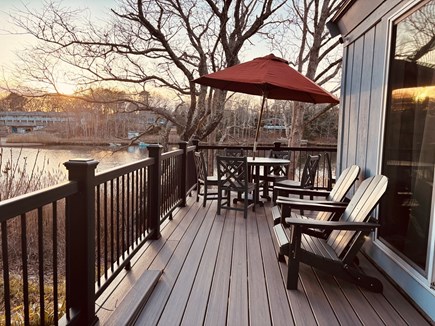 East Falmouth Cape Cod vacation rental - Amazing sunsets 4 adirondack chairs 2 tables to dine al fresco