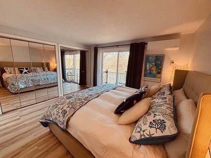 East Falmouth Cape Cod vacation rental - Primary suite with balcony to watch the swans, en suite bathroom