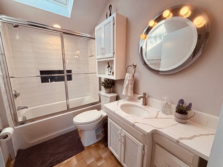 East Falmouth Cape Cod vacation rental - Primary en-suite bath with tub/shower, skylight