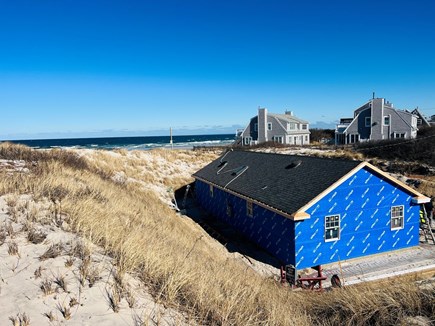 Dennis, Mayflower/Bayview Beach Cape Cod vacation rental - Side elevation of the home. Worked completion is April 2025.