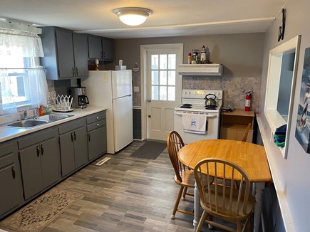 Yarmouth Cape Cod vacation rental - Kitchen. Door to enclosed porch<br/>