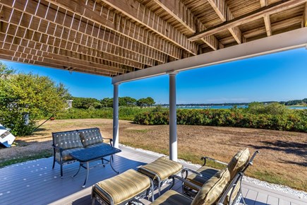 Wellfleet Cape Cod vacation rental - Patio below deck is a shady spot to relax and enjoy the view