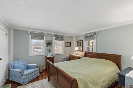 Truro Cape Cod vacation rental - Primary bedroom on the first level with a queen bed