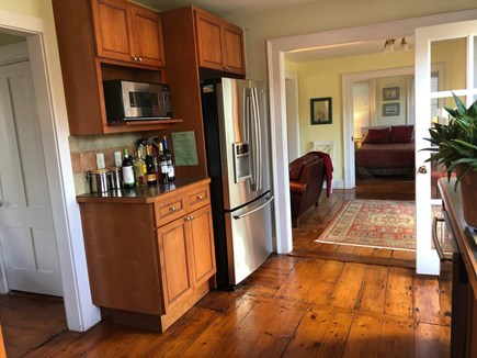 Provincetown Cape Cod vacation rental - Fridge and Bar space leading to the family room