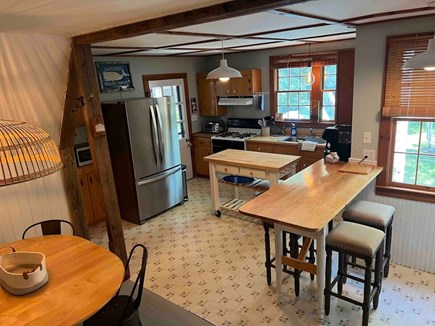 South Orleans Cape Cod vacation rental - View of Kitchen, Breakfast Bar, and Island, a Mix of Old and New!