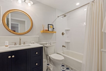 Brewster Cape Cod vacation rental - Guest bathroom with tub/shower combo