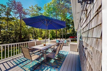 Brewster Cape Cod vacation rental - Back deck w/grill, dining, & lounging overlooking Greenland Pond