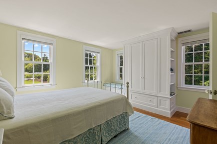 Eastham Cape Cod vacation rental - First floor primary bedroom with a queen bed