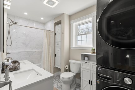 East Falmouth Cape Cod vacation rental - 2nd Floor Master Bathroom with bathtub and washer/dryer