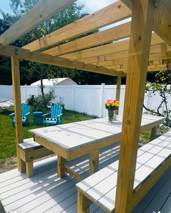 East Falmouth Cape Cod vacation rental - Backyard Paradise - Custom pergola, grape vines, lawn furniture