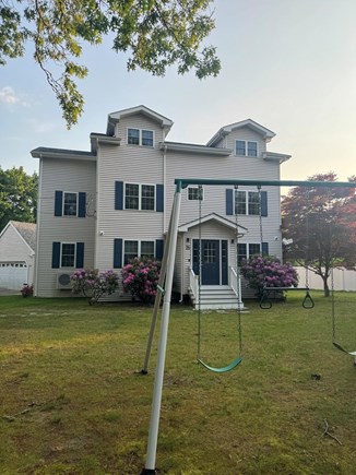 East Falmouth Cape Cod vacation rental - Front exterior - Swing set<br/>